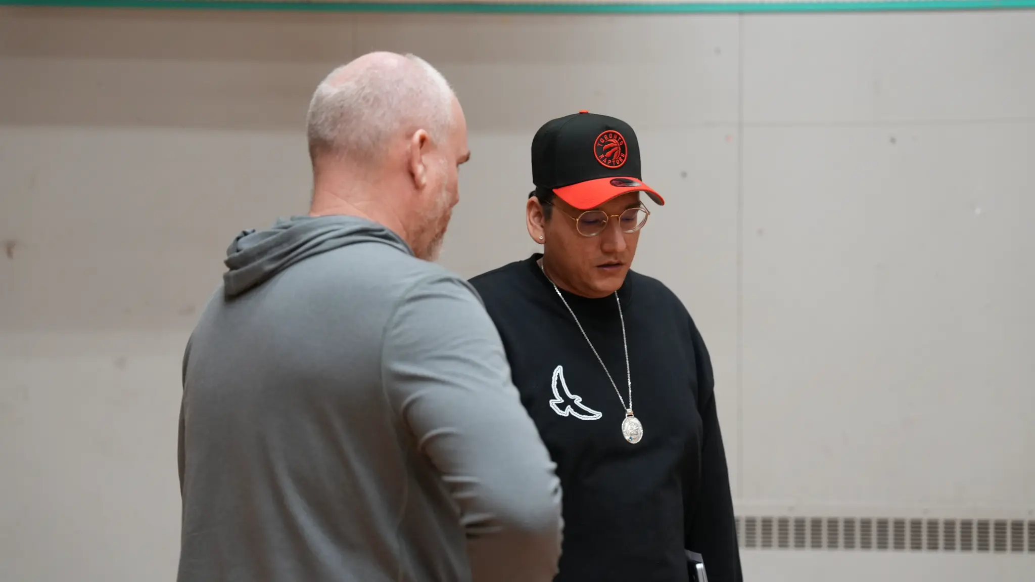 Dakota Bear in conversation after a training session